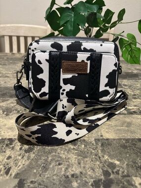 Wrangler Black and White Cow Print Crossbody with Braided Trim
